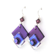 Purple and blue square glass earrings on a white background