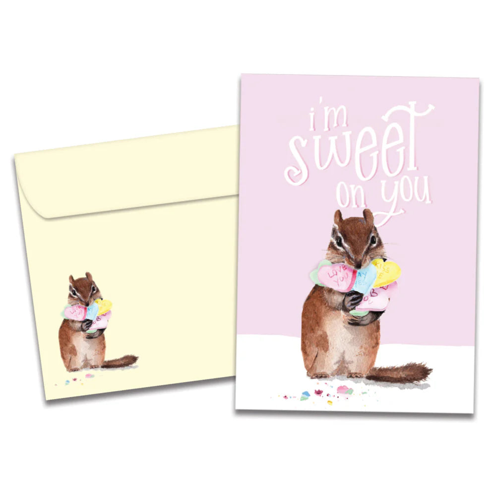 Greeting card with a chipmunk holding ice cream and a matching envelope on a white background