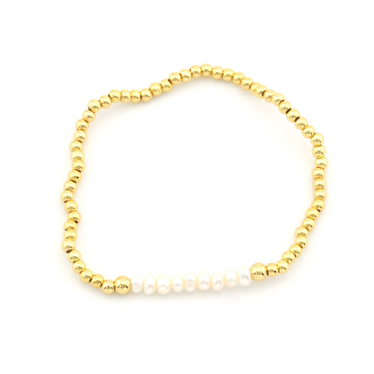 A delicate beaded bracelet featuring small metallic gold beads and a row of white freshwater pearls on one side, displayed on a clean white background.