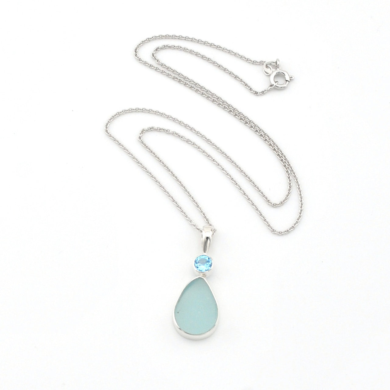 Necklace with a teardrop-shaped pendant on a white background