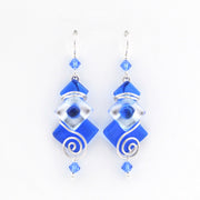 Blue and silver earrings on a white background