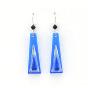 Blue glass earrings on white background