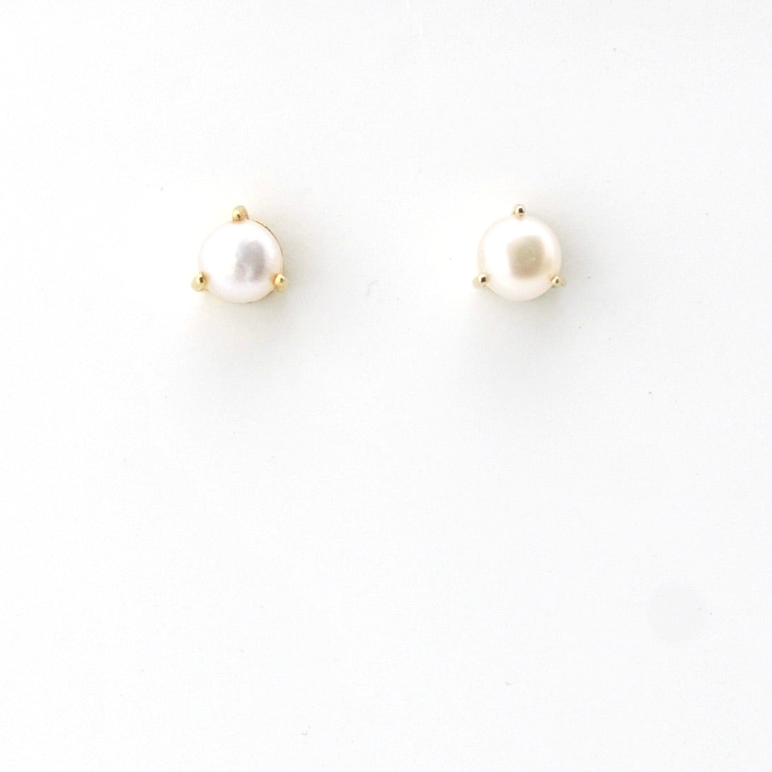 Pair of pearl earrings on a white background