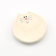 Dish with a cat face on a white background