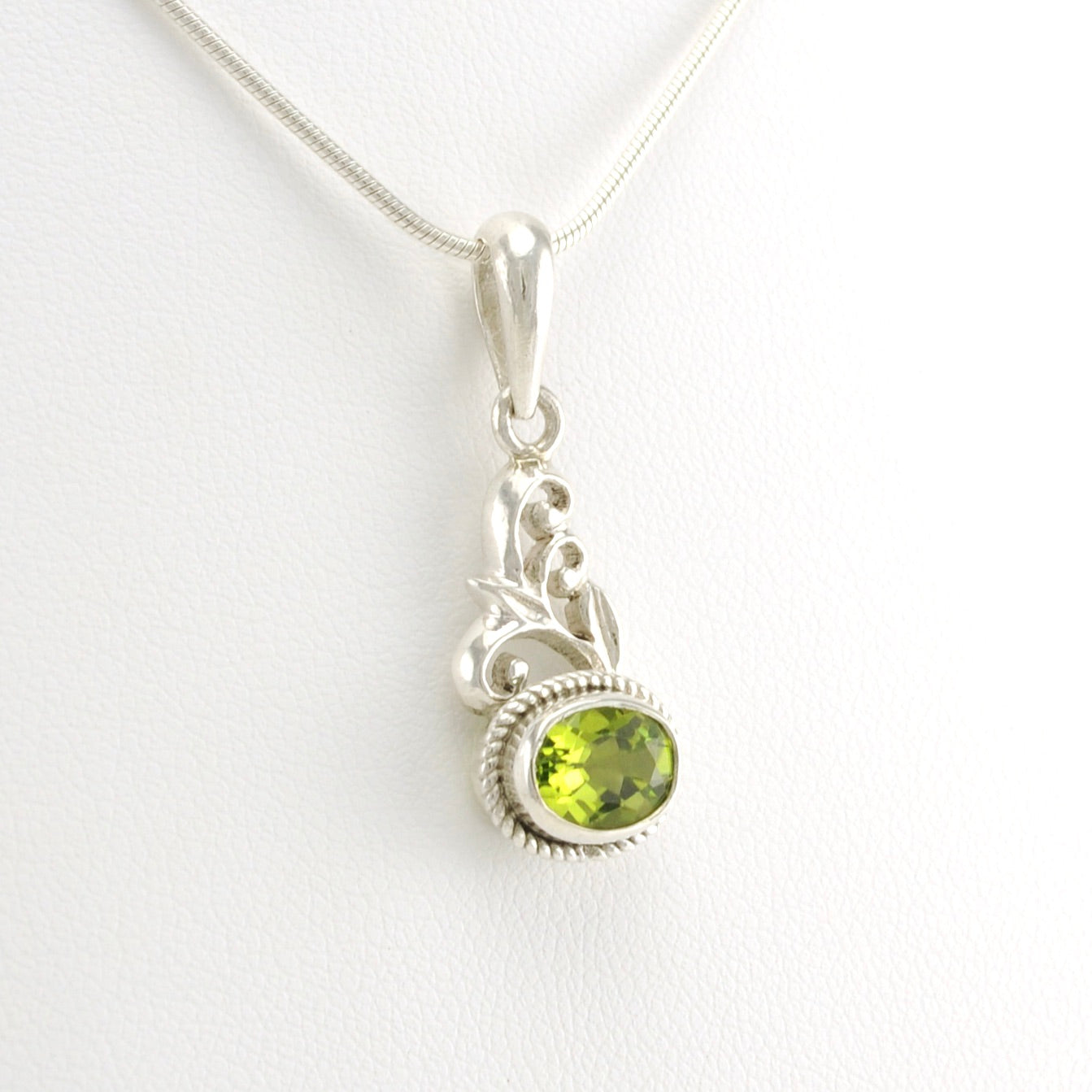 Side View Sterling Silver Peridot 6x8mm Oval Pendant