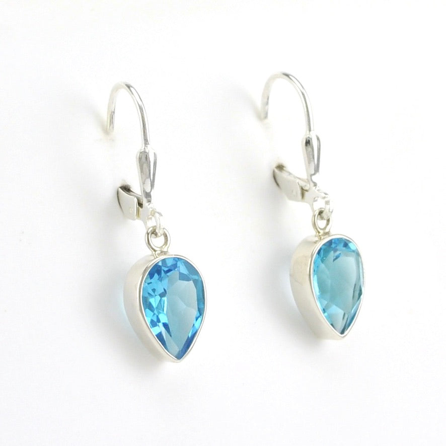 Side View Sterling Silver Blue Topaz 7x10mm Pear Dangle Earrings