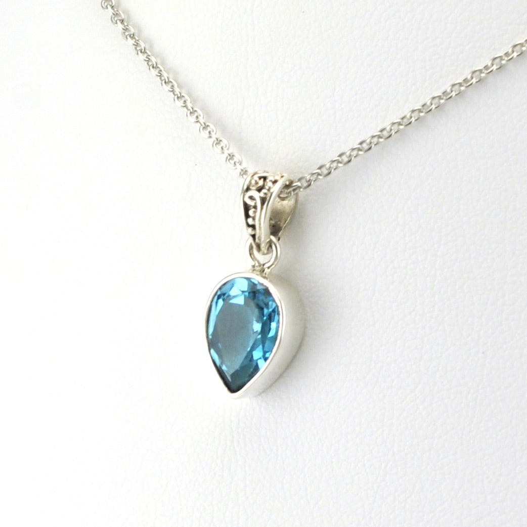 Side View Sterling Silver Blue Topaz 7x10mm Pear Necklace