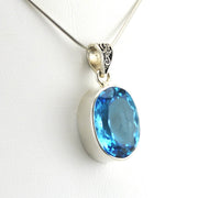Side View Sterling Silver Blue Topaz 13x18mm Oval Pendant