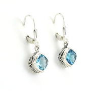 Side View Sterling Silver Blue Topaz 7mm Offset Square Bali Earrings