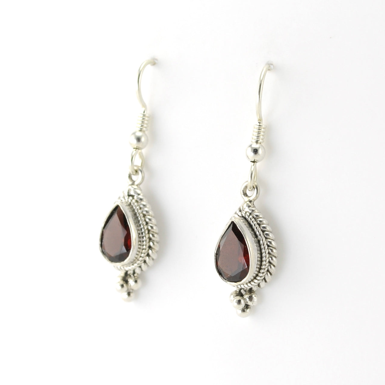 Side View Sterling Silver Garnet 6x9mm Teardrop Dangle Earring