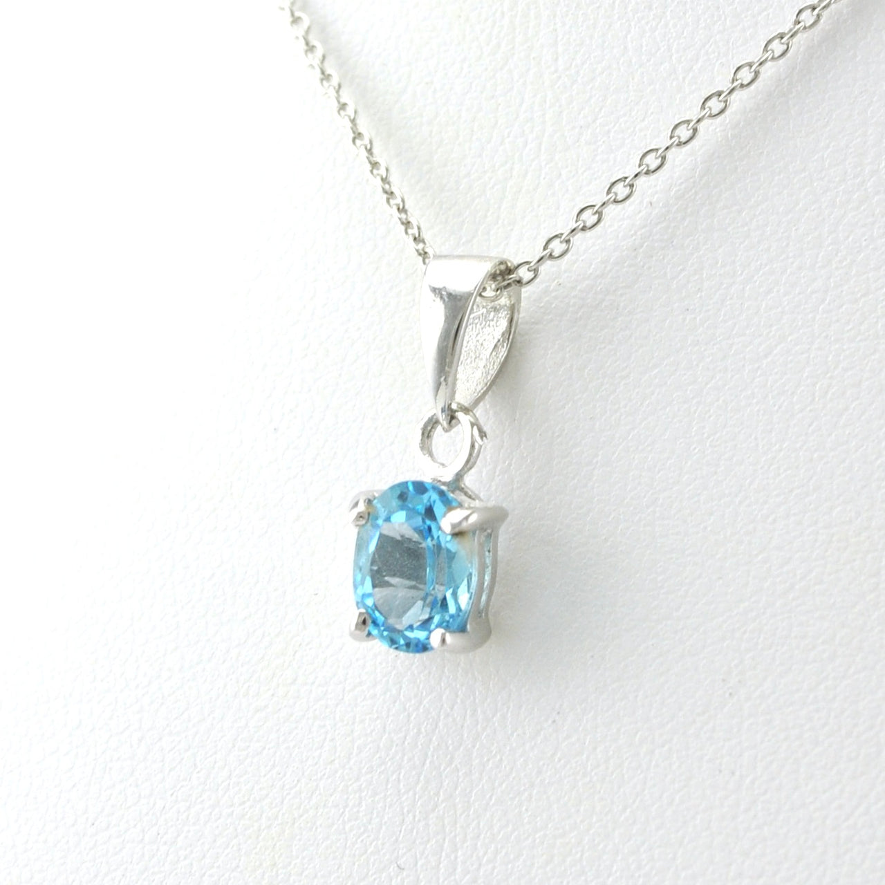 Side View Sterling Silver Blue Topaz 6x8mm Oval Necklace