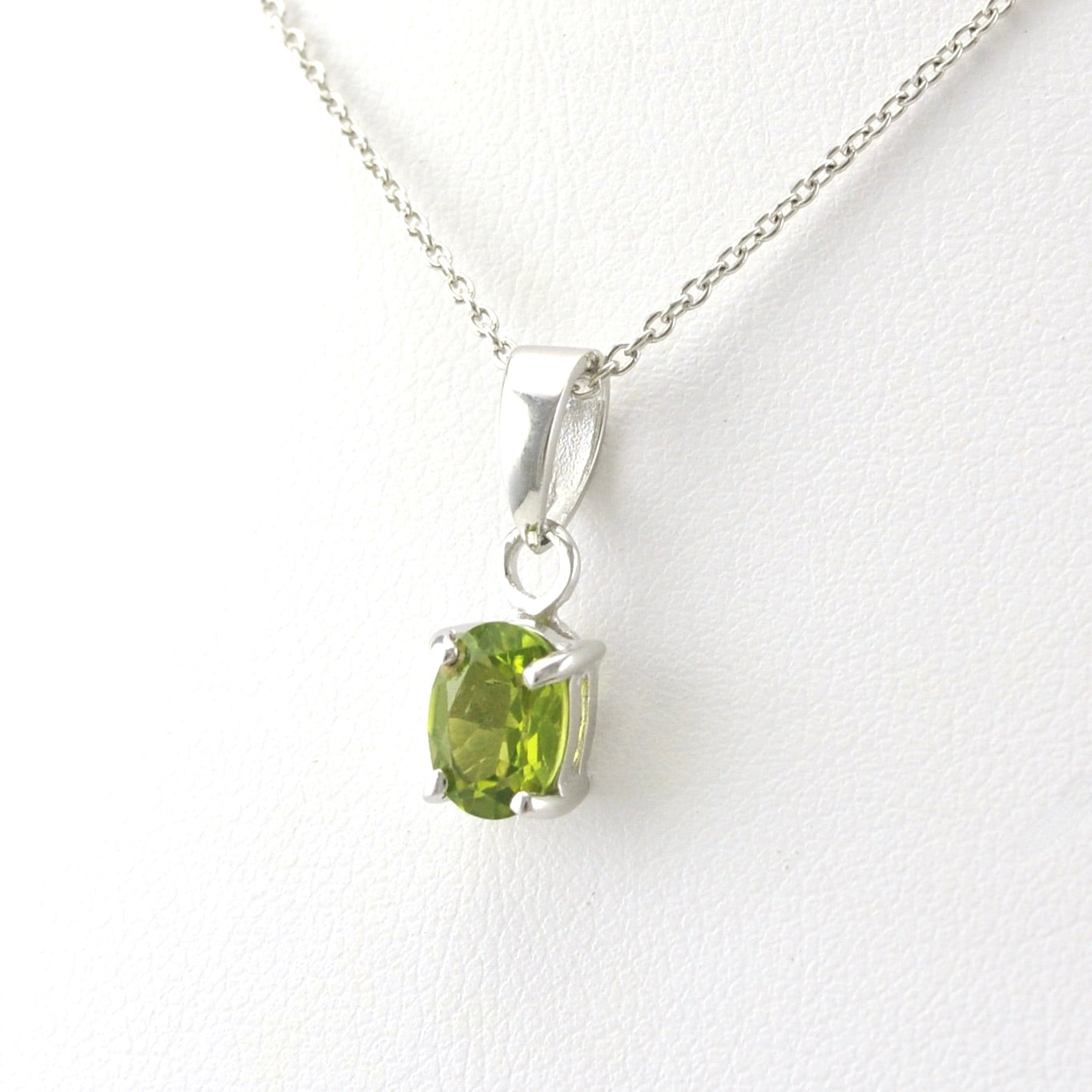 Side iew Sterling Silver Peridot 6x8mm Oval Necklace