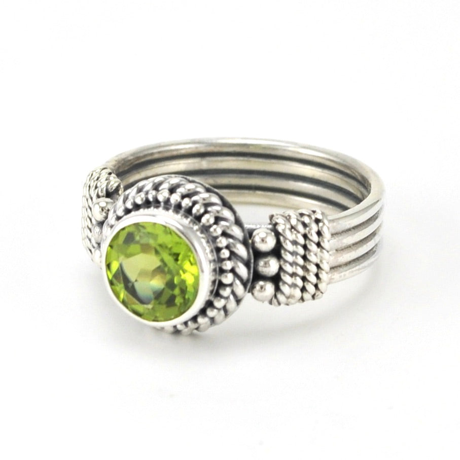 Side View Sterling Silver Peridot 7mm Round 4 Band Ring