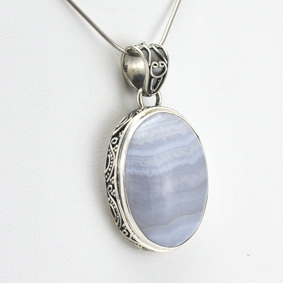 Side View Sterling Silver Blue Lace Agate 20x27mm Oval Bali Pendant