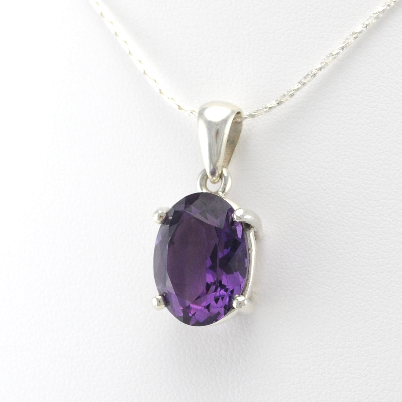 Side View Sterling Silver Amethyst 12x16mm Oval Prong Set Pendant