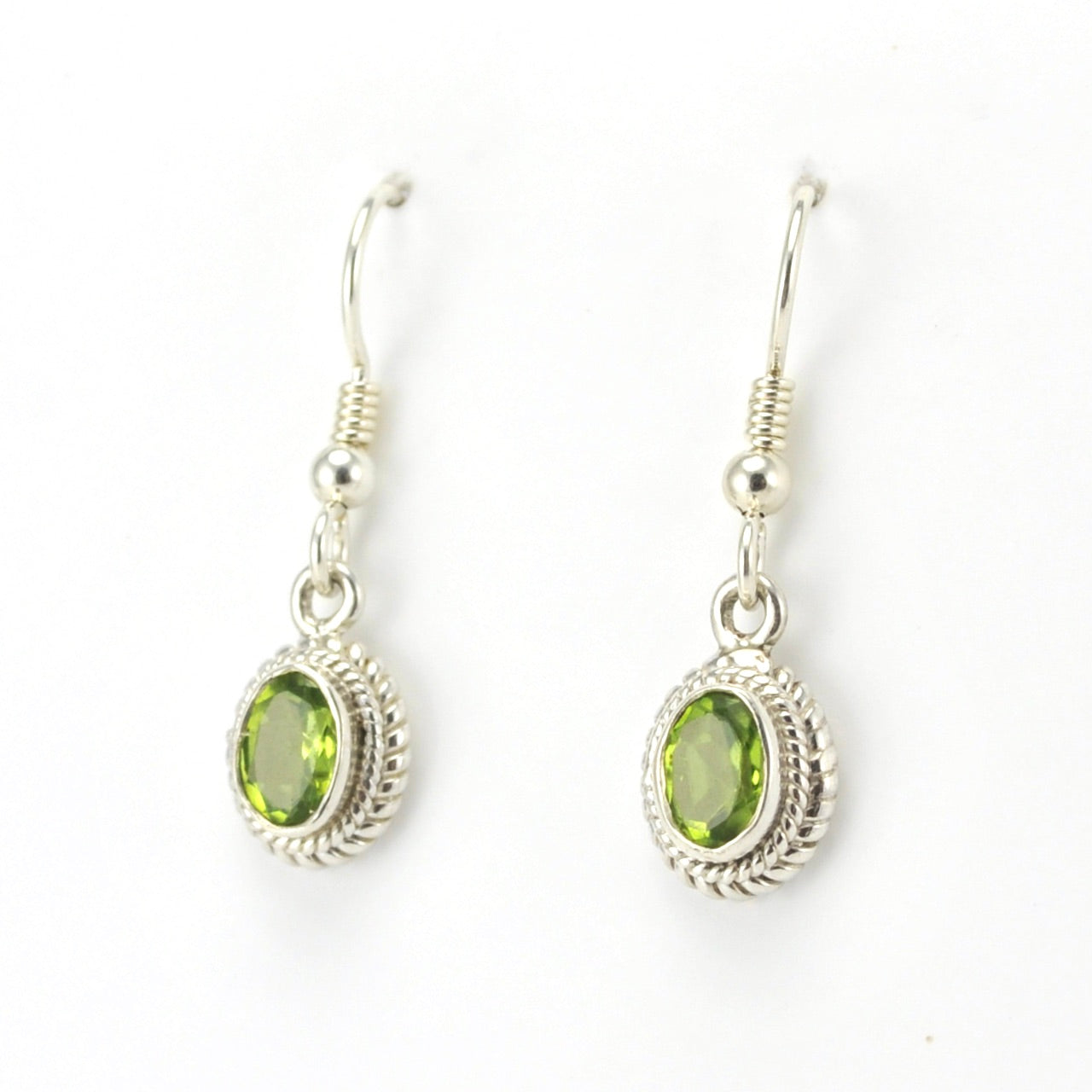 Side View Sterling Silver Peridot 5x7mm Oval Dangle Earrings