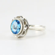 Side View Sterling Silver Blue Topaz 7x9mm Oval Ring