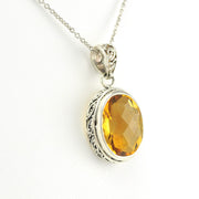 Side View Sterling Silver Citrine 10x14mm Oval Bali Pendant