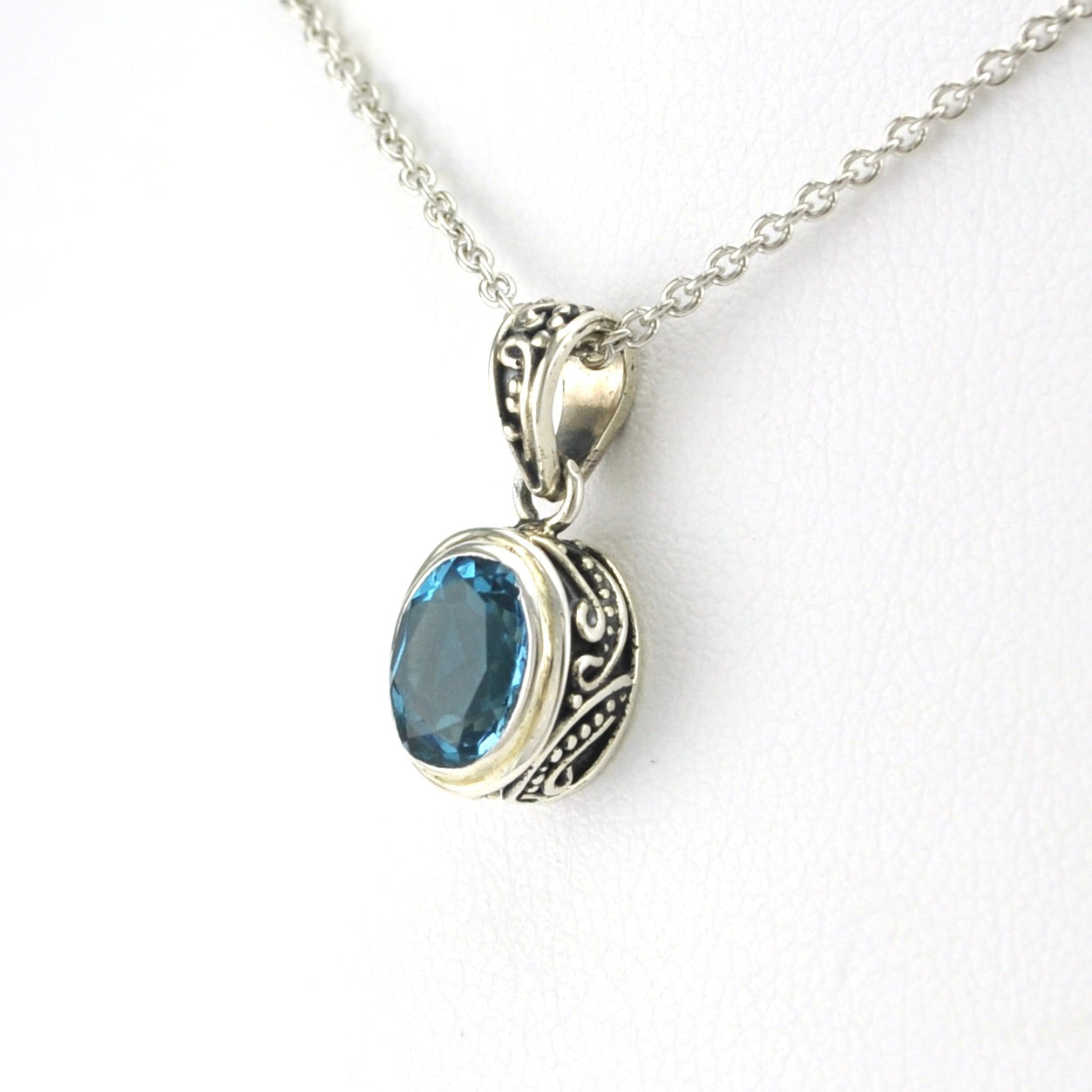 Side View Sterling Silver Blue Topaz 6x8mm Oval Necklace