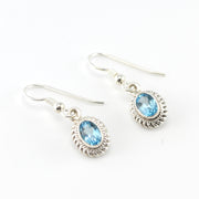 Sterling Silver Blue Topaz 5x7mm Oval Dangle Earrings