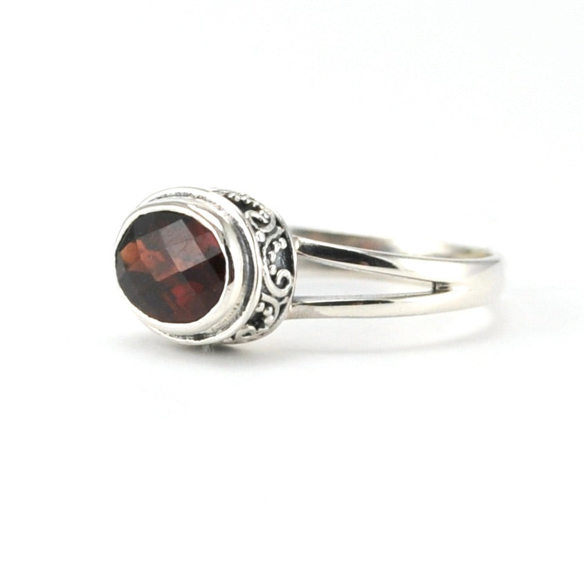 Sterling Silver Garnet 6x8mm Side Oval Bali Ring