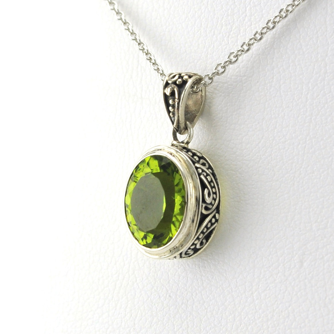 Side View Sterling Silver Peridot 8x10mm Oval Bali Necklace