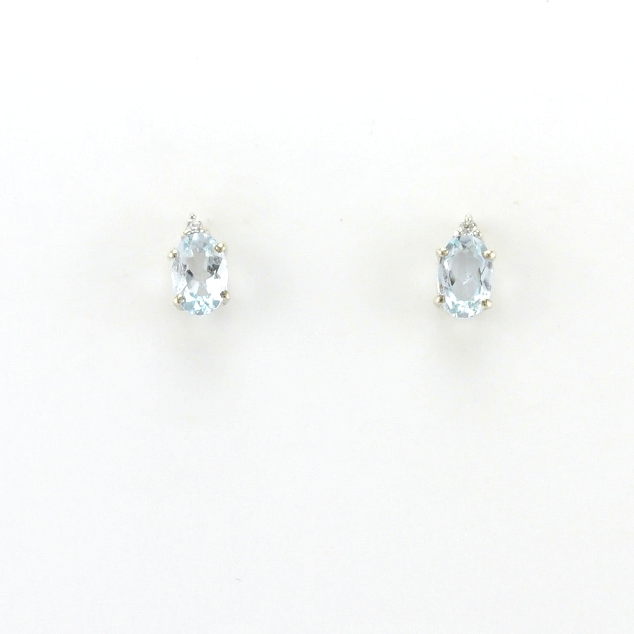 Alt View Sterling Silver Aquamarine .8ct Oval Cubic Zirconia Earrings