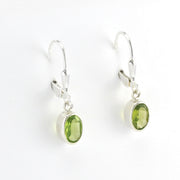 Side View Sterling Silver Peridot 5x7mm Oval Dangle Earrings