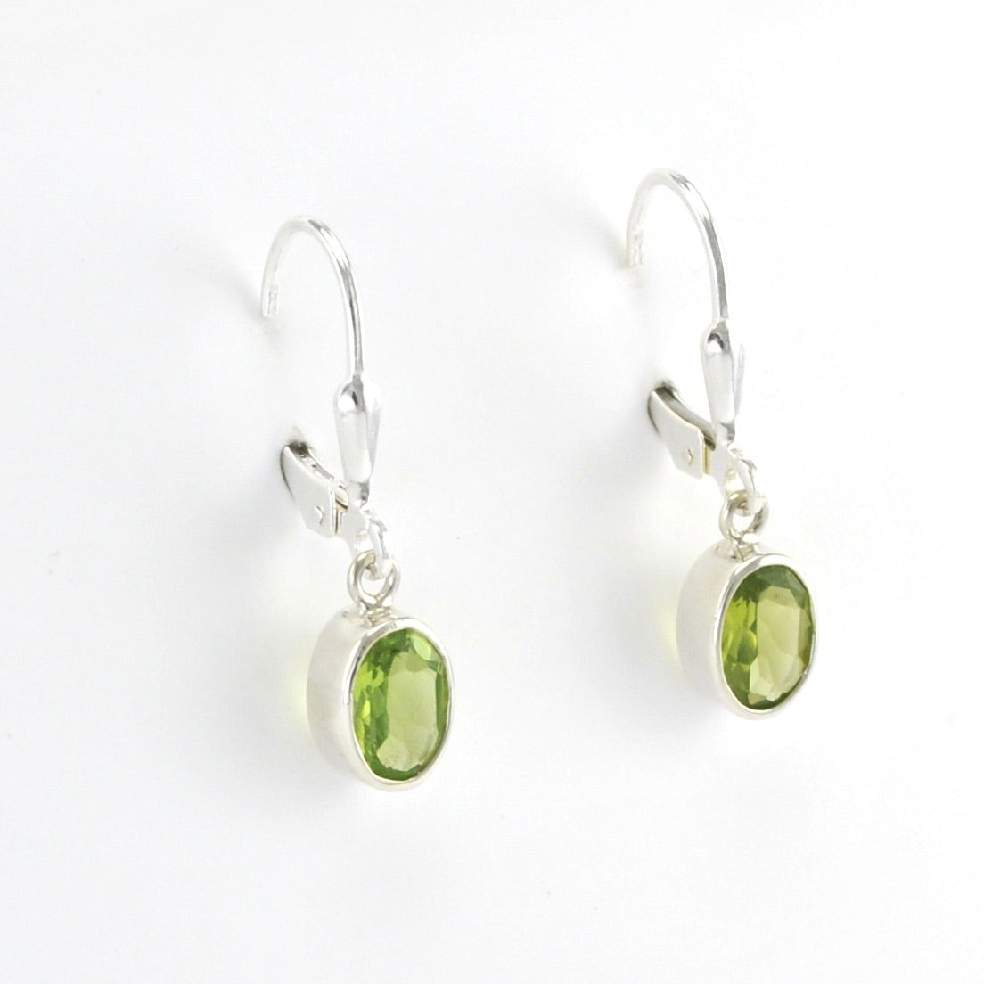 Side View Sterling Silver Peridot 5x7mm Oval Dangle Earrings