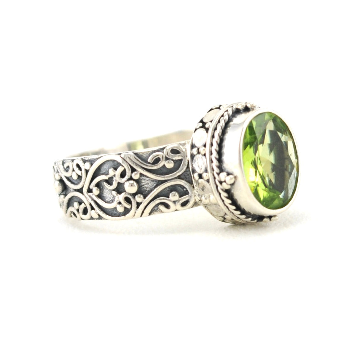 Side View Sterling Silver Peridot 7x9mm Oval Bali Ring