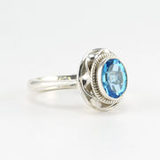 Alt View Sterling Silver Blue Topaz 7x9mm Oval Ring