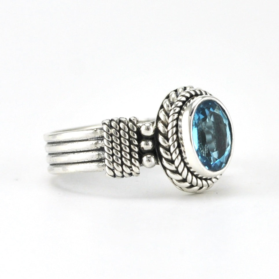Side View Sterling Silver Blue Topaz 6x8mm Oval 4 Band Ring