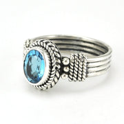 Alt View Sterling Silver Blue Topaz 6x8mm Oval 4 Band Ring
