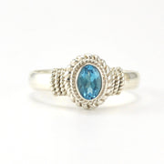 Sterling Silver Blue Topaz 4x6mm Oval Rope Ring