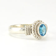 Side View Sterling Silver Blue Topaz 4x6mm Oval Rope Ring
