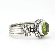 Alt View Sterling Silver Peridot 7mm Round 4 Band Ring