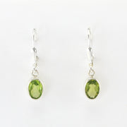Alt View Sterling Silver Peridot 5x7mm Oval Dangle Earrings