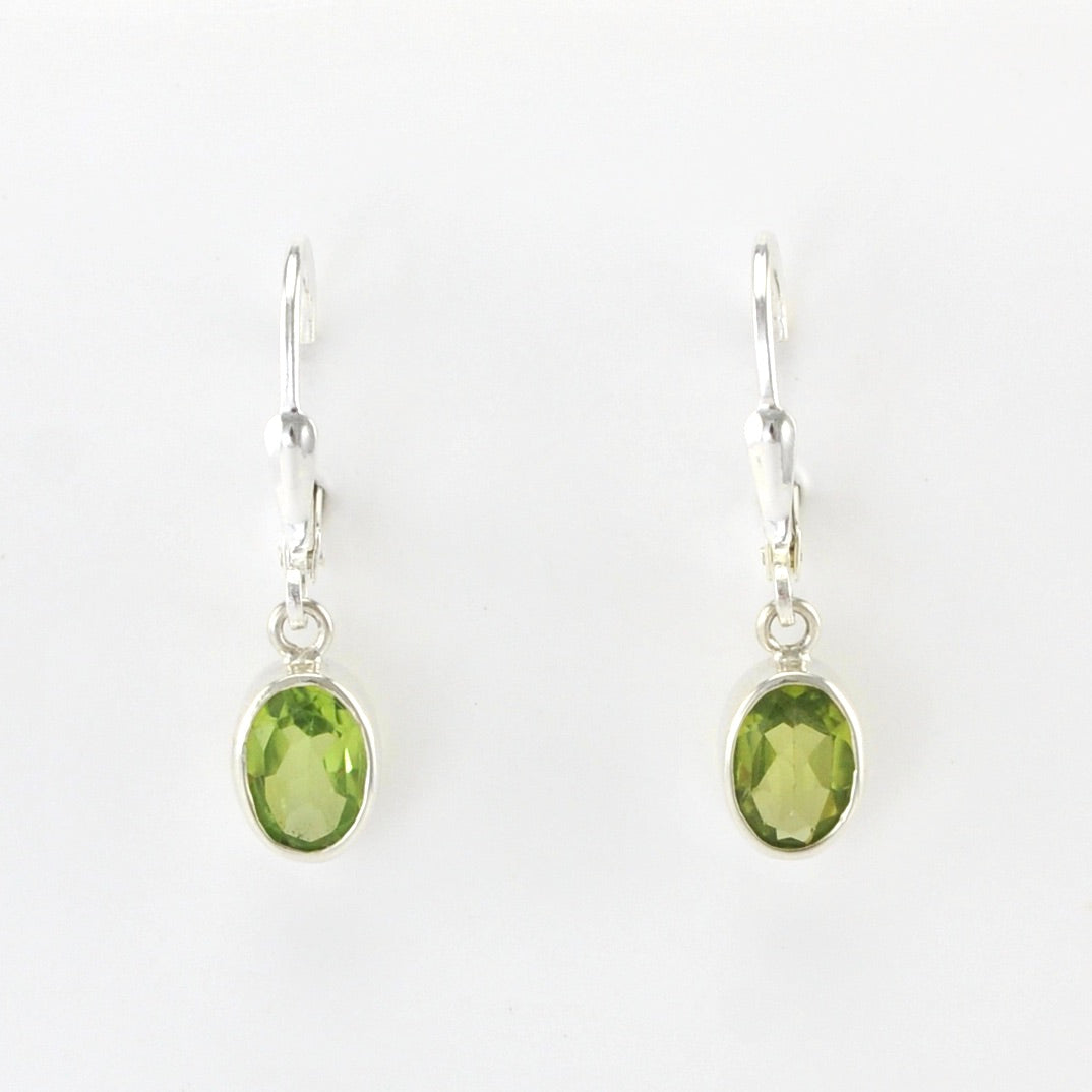 Alt View Sterling Silver Peridot 5x7mm Oval Dangle Earrings
