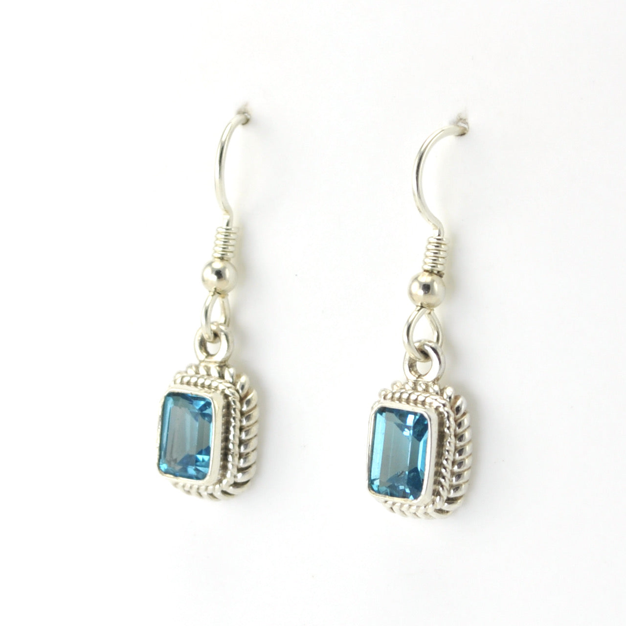 Side View Silver Blue Topaz 5x7mm Rectangle Dangle Earrings