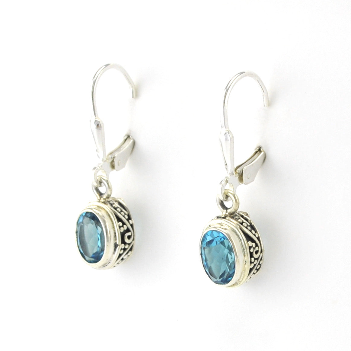 Silver Blue Topaz 5x7mm Oval Bali Dangle Earrings