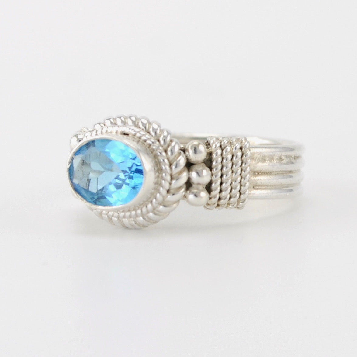 Side View Silver Blue Topaz 6x8mm Oval Ring