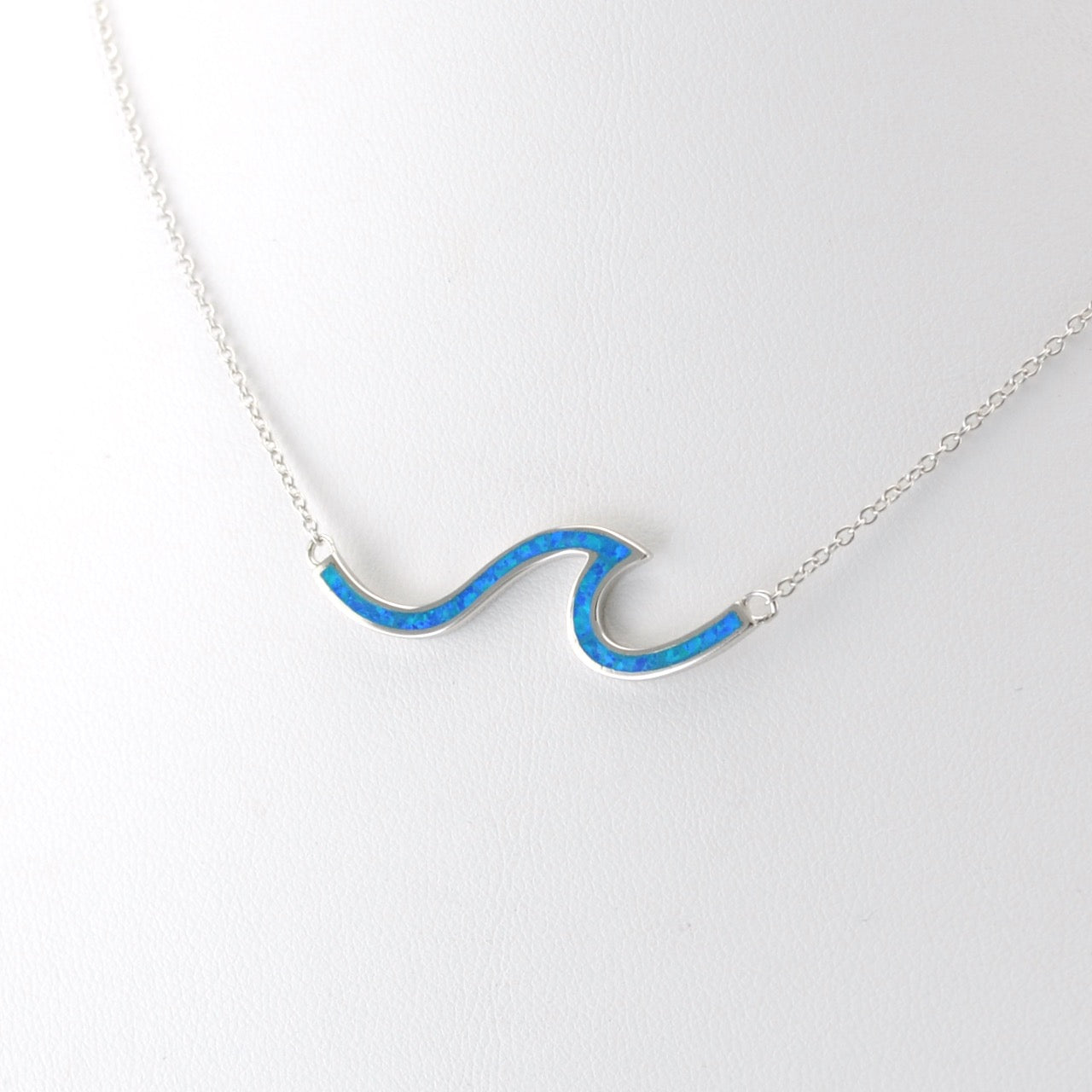 Side View Silver Created Blue Opal Wave Necklace