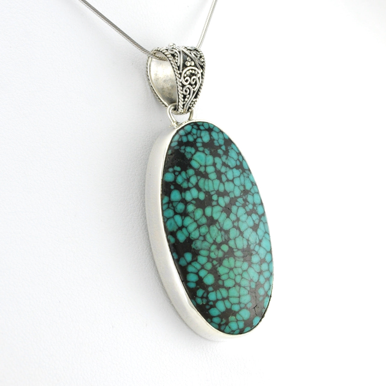 Side View Silver Tibetan Turquoise 22x38mm Oval Pendant
