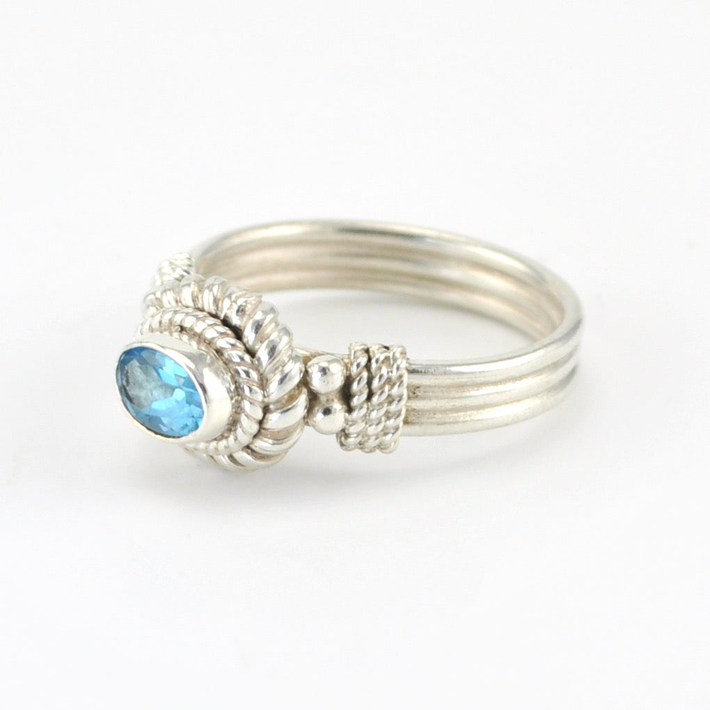 Side View Silver Blue Topaz 4x6mm Oval Ring