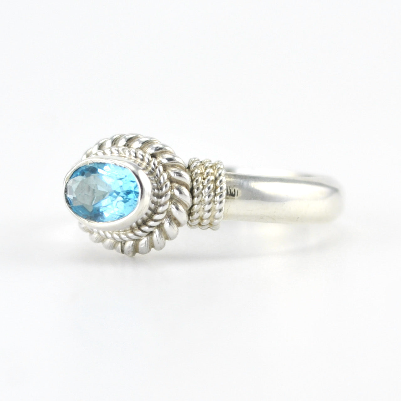 Side View Silver Blue Topaz 4x6mm Oval Rope Ring