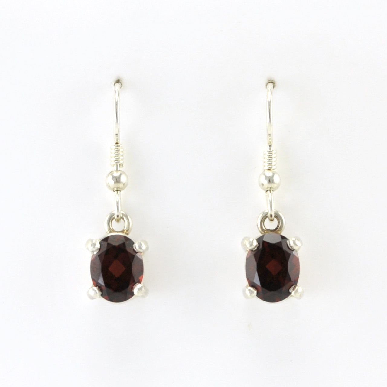 Alt View Silver Garnet 7x9mm Prong Set Oval Dangle Earrings