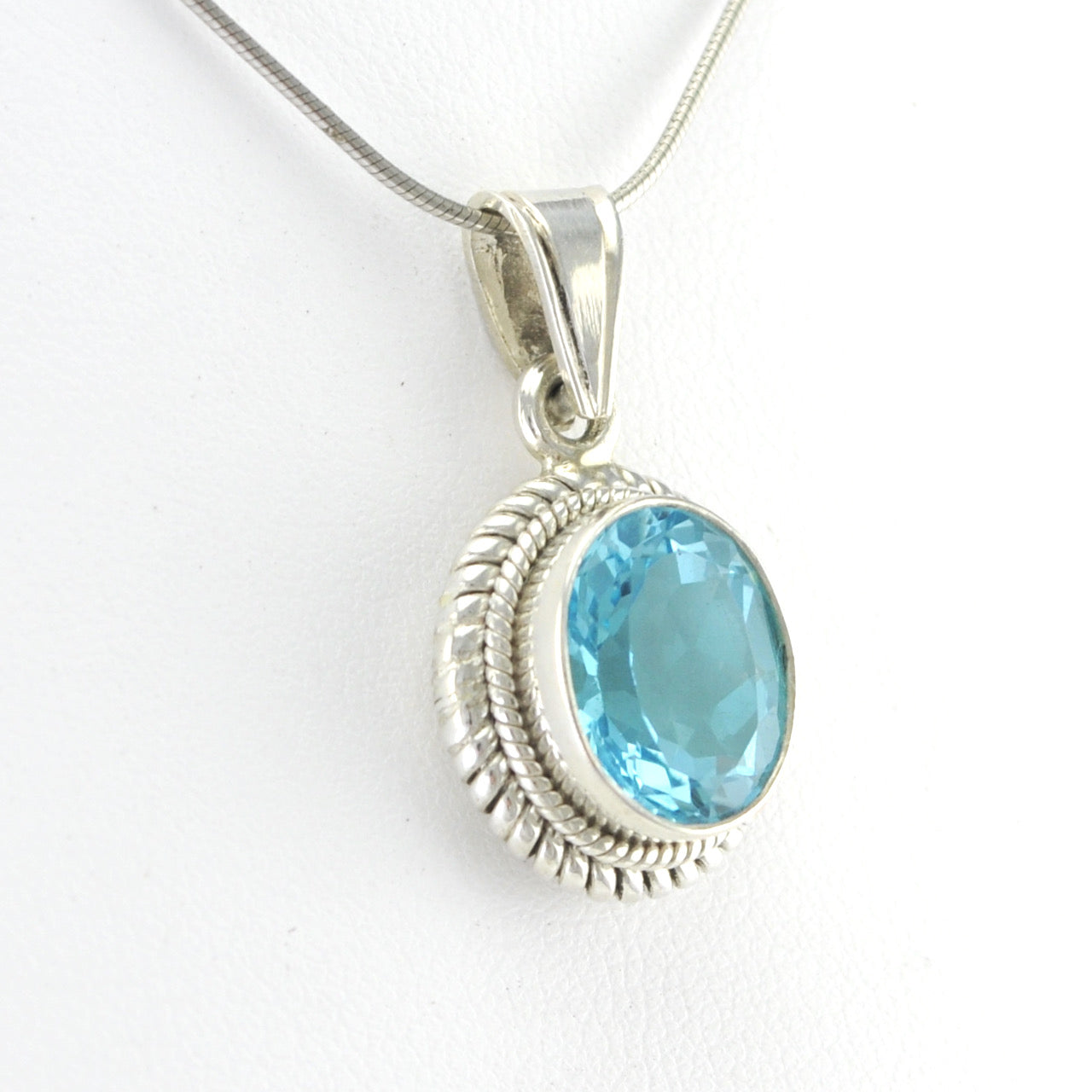 Side View Sterling Silver Blue Topaz 10x12mm Oval Pendant