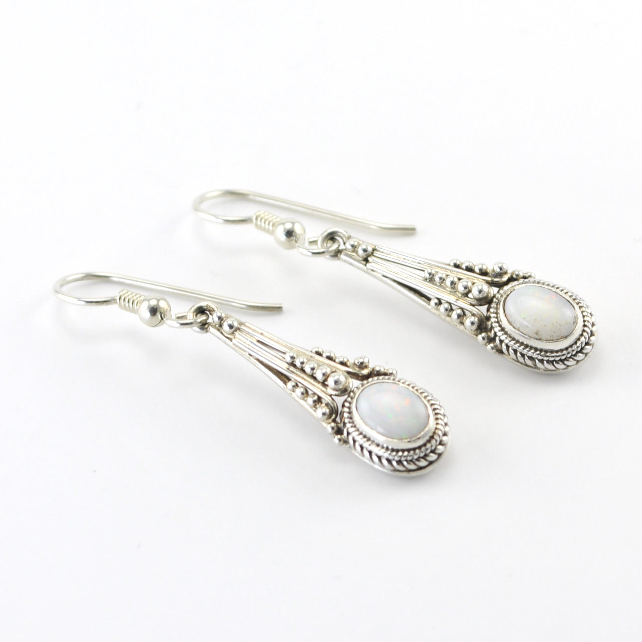 Side View Silver Opal 5x7mm Oval Long Dangle Earrings