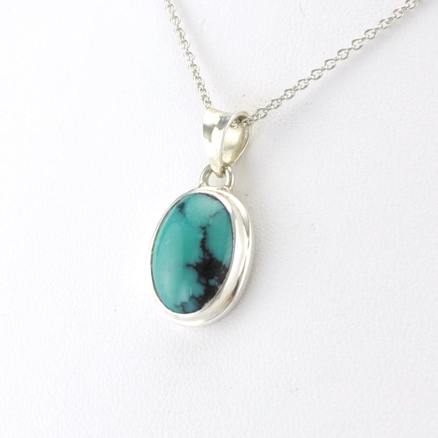 Side View Silver Turquoise Oval Necklace