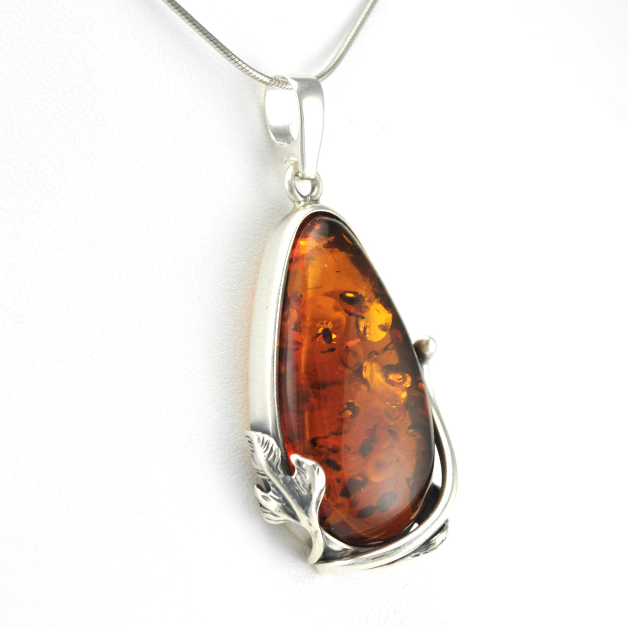 Side View Sterling Silver Amber Tear Pendant with Leaf Detail